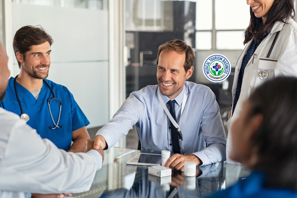 Facilitator reviewing agreements with a patient